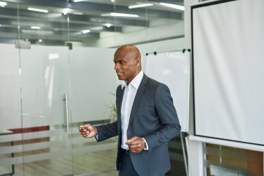 Boss with skeptical face look at worker at meeting