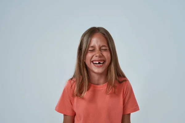 Portrait of laughing little girl with closed eyes — Stock Photo, Image