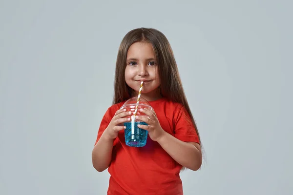 Partial image of little girl drinking soda drink — Stock Photo, Image
