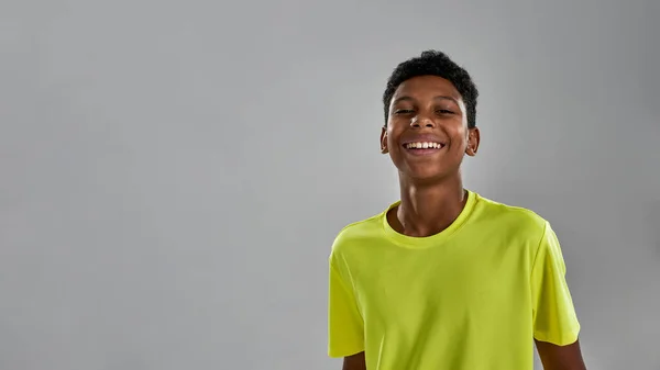 Partial image of smiling black boy look at camera — Stock Photo, Image