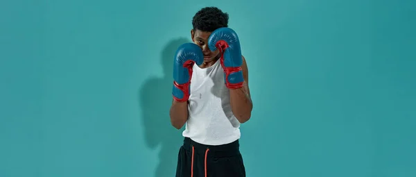 Cropped image of serious black boy boxer boxing — Fotografia de Stock