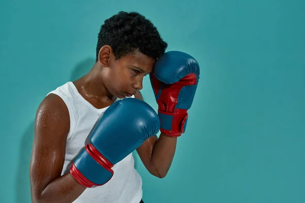 Partial image of focused black boy boxer boxing — ストック写真