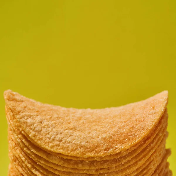 Cropped close up of stack of tasty chips — Stockfoto