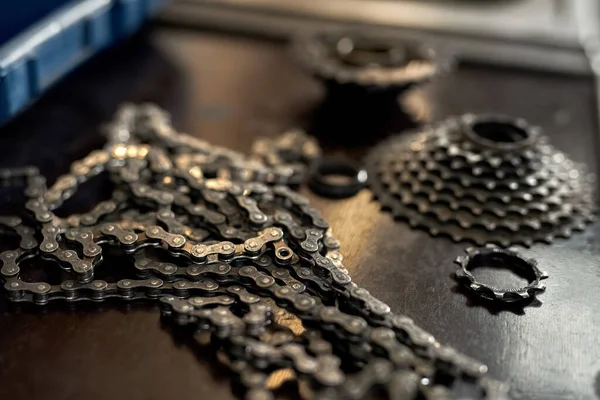 Focus of bike chain with bicycle cassette on table