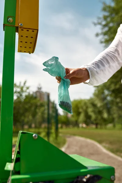 Cropped Woman Throwing Waste Bag Dog Shit Trash Bin Blurred — Stock Fotó