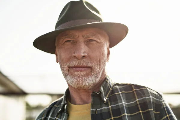 Portrait Cropped Elderly Male Farmer Looking Away Focused Grey Hair — Stockfoto