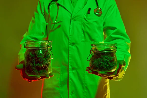 Partial Male Doctor Holding Jars Dry Marijuana Buds Hands Man — Foto de Stock