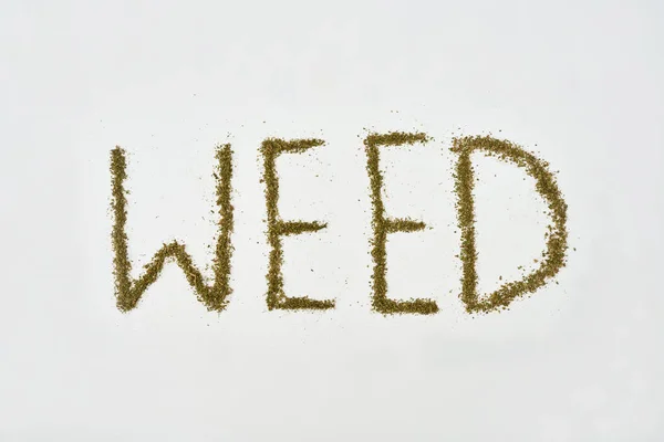 Ziołowe Słowo Suchej Zgniecionej Marihuany Odizolowanej Białym Tle Lekki Narkotyk — Zdjęcie stockowe