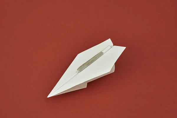 Cannabis Rolled Joint White Paper Plane Red Background Light Narcotic — 스톡 사진