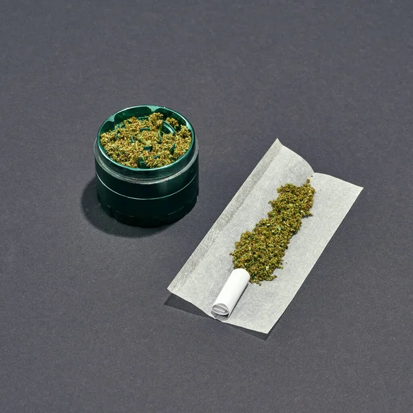 Dry Crushed Marijuana Jar Paper Cannabis Rolled Joint Grey Background — Fotografia de Stock