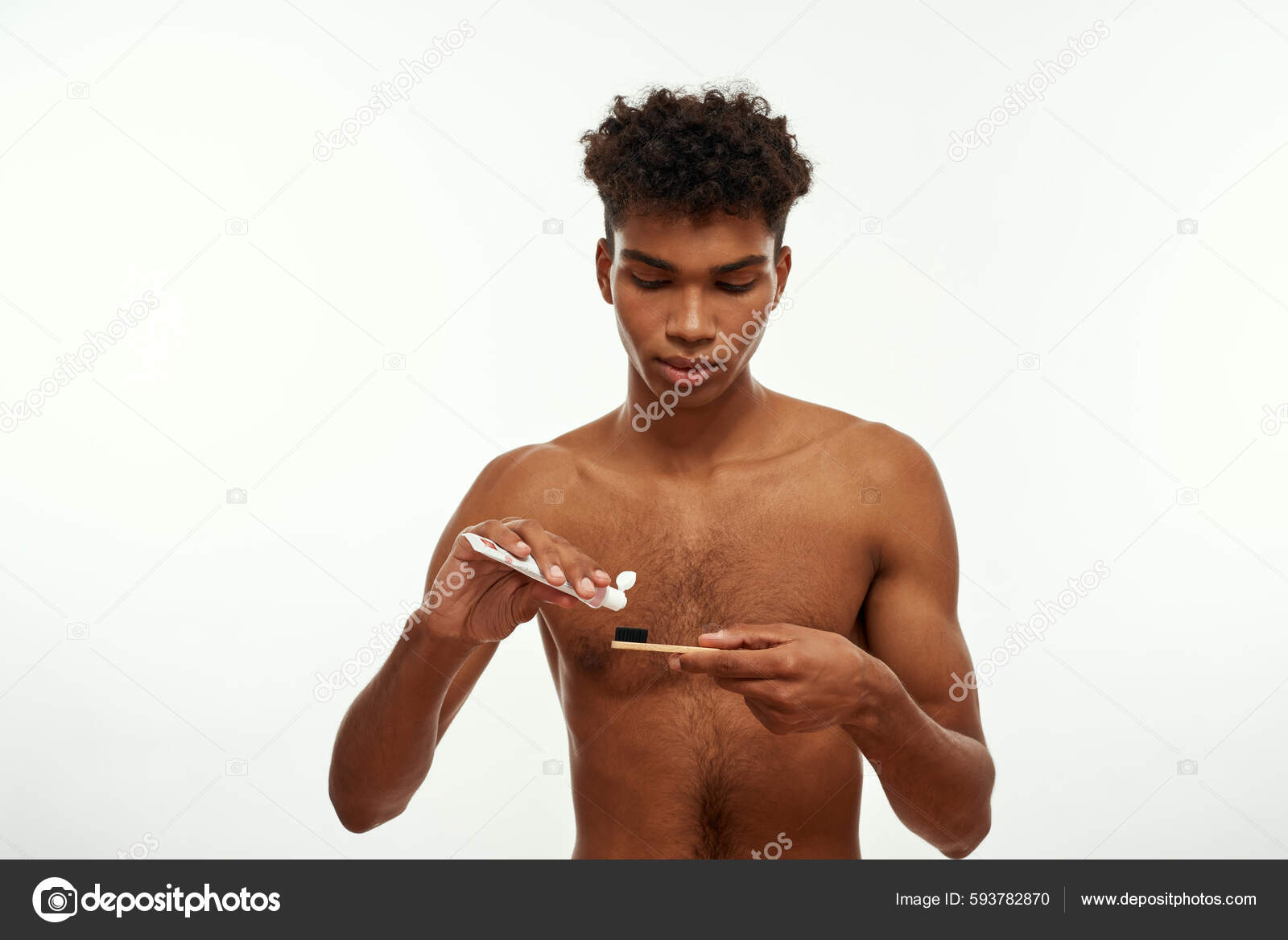 Focused Black Guy Pouring Toothpaste Toothbrush Brushing Teeth Young  Brunette Stock Photo by ©LanaStock 593782870