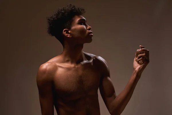 Good Looking Black Guy Applying Luxury Aromatic Perfume Himself Profile — Stock Fotó