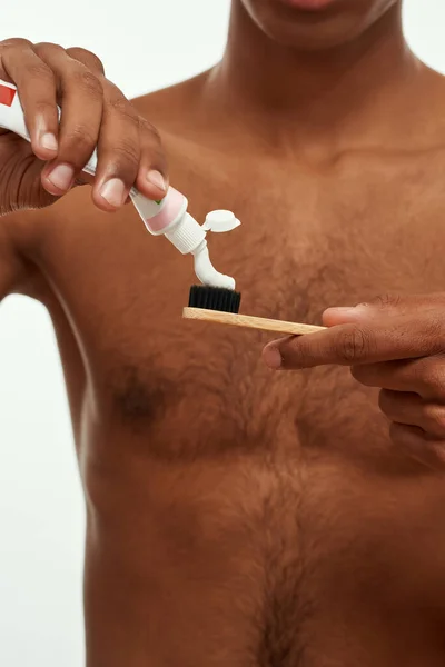 Selective Focus Black Guy Pouring Toothpaste Toothbrush Brushing Teeth Obscure — Stok Foto