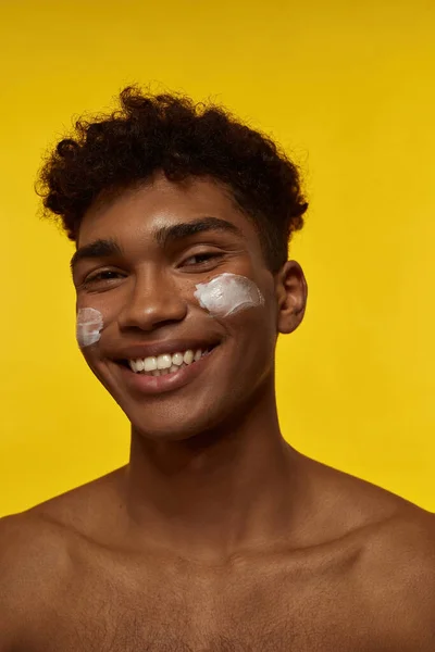Partial Image Smiling Black Guy Cosmetic Cream His Face Looking — Stock Fotó