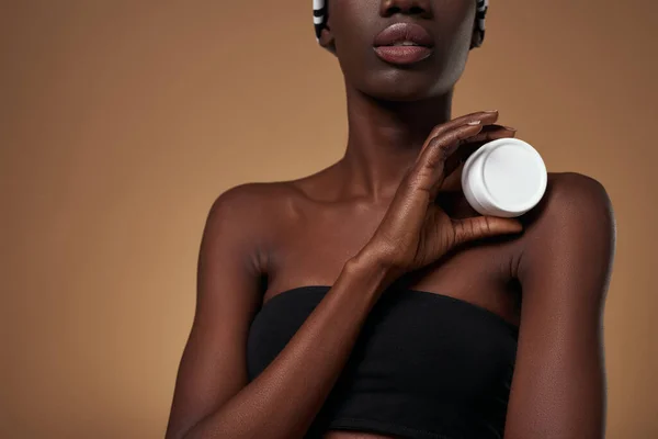 Obscure Face Elegant Black Girl Holding Container Cosmetic Cream Beautiful — Foto de Stock