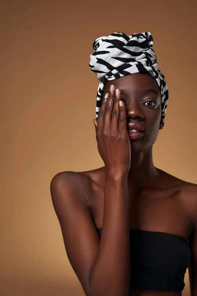 Stylish Black Girl Wearing Traditional African Turban Covering Half Face — Stok fotoğraf