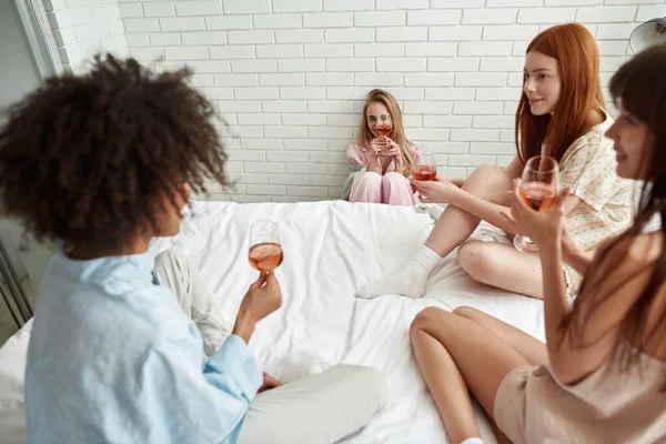 Young Multiracial Girlfriends Drinking Wine Girlish Pajama Party Home Black — Foto de Stock