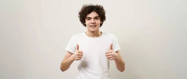 Front View Smiling Caucasian Teenage Boy Showing Thumbs Looking Camera — Stock Photo, Image