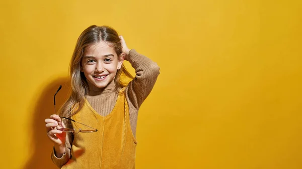 Smiling Caucasian Little Girl Holding Glasses Looking Camera Partial Image — Stock Photo, Image