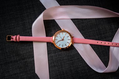 Pink analog watch as a gift