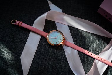 Pink analog watch as a gift