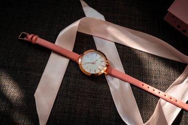 Pink analog watch as a gift