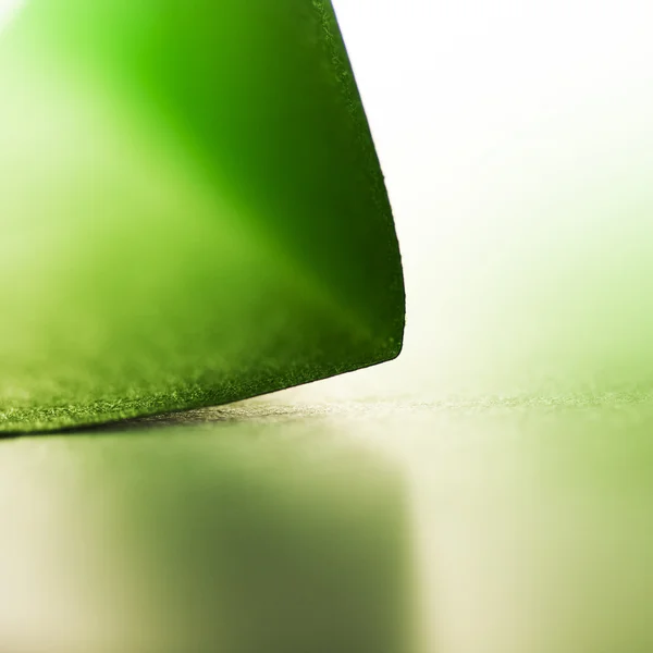 Abstract background picture of a green paper — Stock Photo, Image