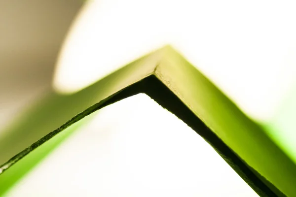 Quadro de fundo abstrato de um livro verde — Fotografia de Stock