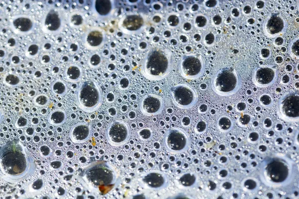 Water drops on transparent plastic surface — Stock Photo, Image