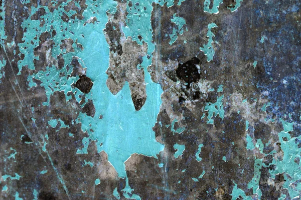 Metallic surface with peeled paint and inverted colors — Stock Photo, Image