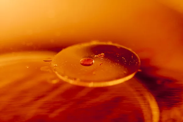 Composition of oil drops on a water surface — Stock Photo, Image