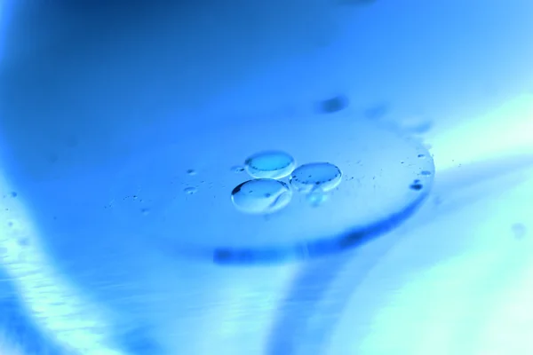 Composition of oil drops on a water surface — Stock Photo, Image