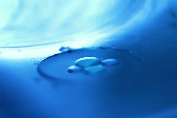 Composition of oil drops on a water surface — Stock Photo, Image