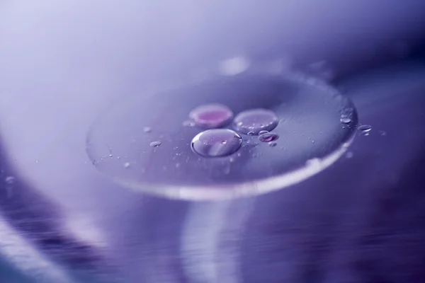 Composition of oil drops on a water surface — Stock Photo, Image