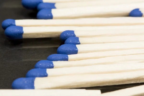 Unused matches with blue head screw — Stock Photo, Image