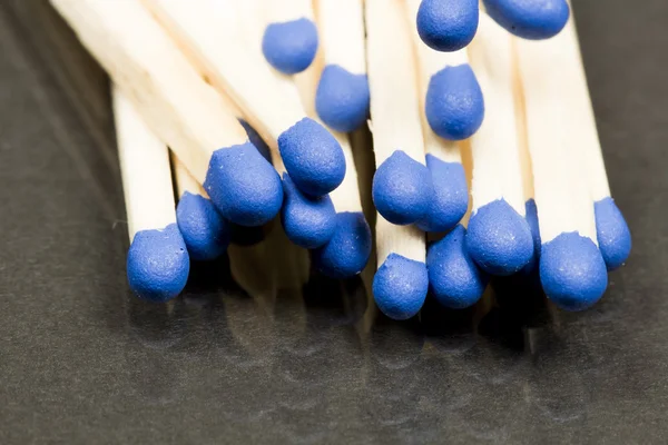 Unused matches with blue head screw — Stock Photo, Image