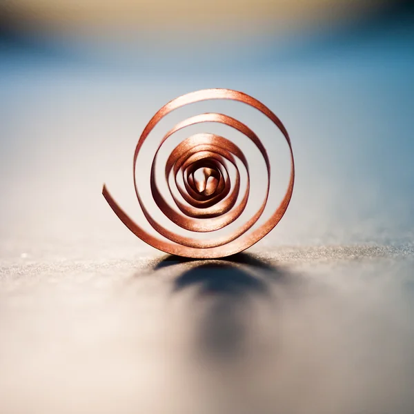 Macro, abstract, background picture of colored paper spirals on paper background — Stock Photo, Image