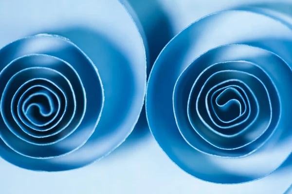 Makro, streszczenie, obraz tła niebieski papier spirale na tło — Zdjęcie stockowe