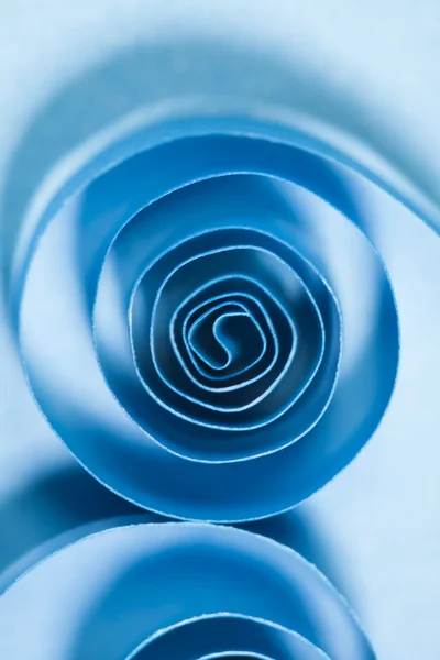 Macro, abstrato, imagem de fundo de espirais de papel azul no fundo de papel — Fotografia de Stock