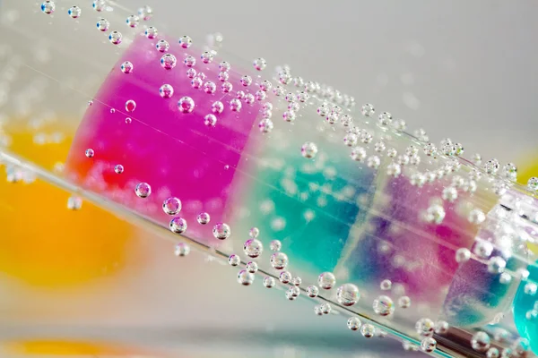Tube with jelly balls — Stock Photo, Image