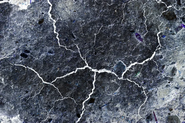 Abstract composition with cracked soil and inverted colors — Stock Photo, Image