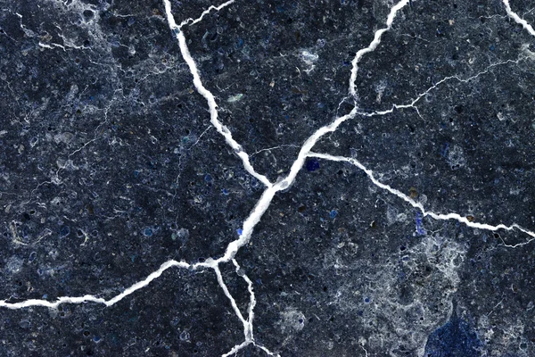 Abstract composition with cracked soil and inverted colors — Stock Photo, Image