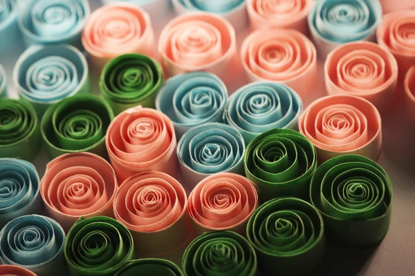 Macro, abstract, background picture of colored paper spirals on paper background — ストック写真