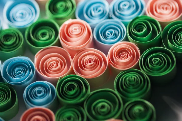 Macro, abstract, background picture of colored paper spirals on paper background — Stock Photo, Image