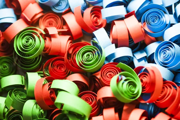 Macro, abstract, background picture of colored paper spirals on paper background — Stock Photo, Image