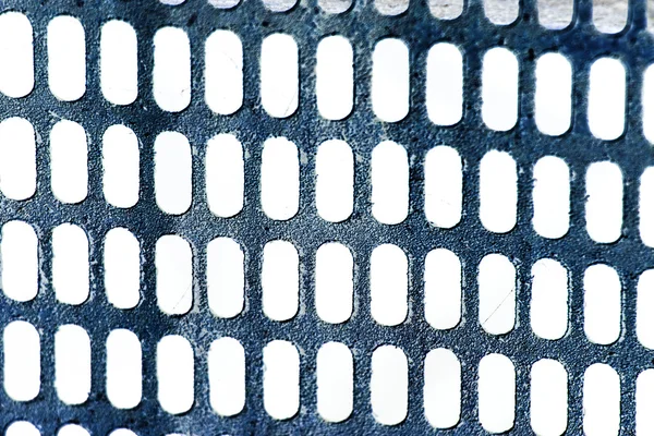 Abstract composition from round, rusty metallic lattice with peeled paint and inverted colors — Stock Photo, Image