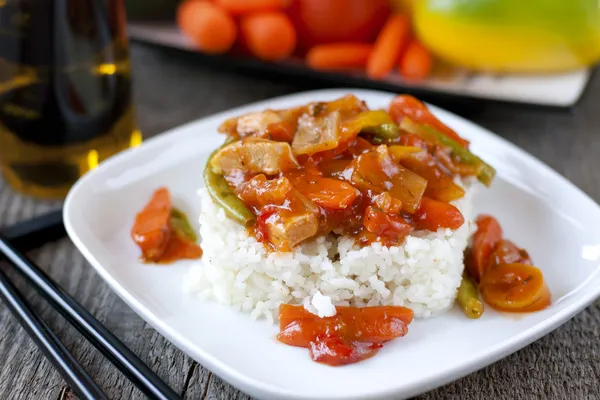 Vegetables and meat in sweet and sour sauce Royalty Free Stock Photos