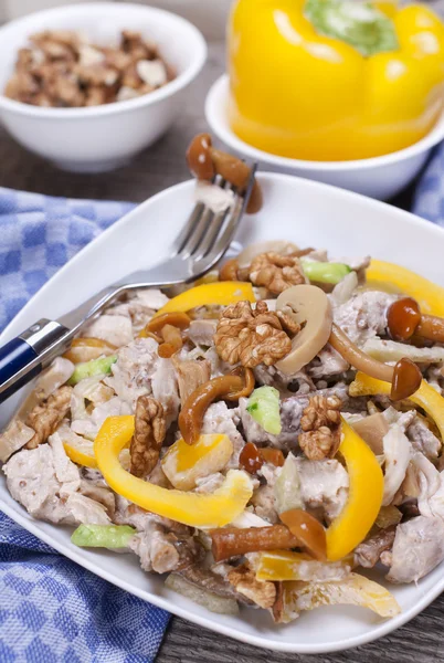 Salad with marinated mushrooms and walnuts — Stock Photo, Image