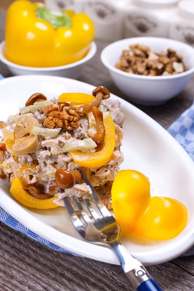 Salad with pickled mushrooms, fillet of chicken, walnuts, sweet — Stock Image Salad with pickled mushrooms, fillet of chicken, walnuts, sweet Stock Image
