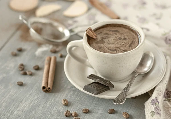 Cup of coffee with cinnamon — Stock Photo, Image